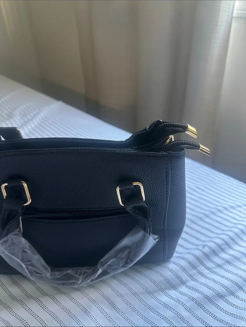 Black structure Macy’s brand full Leather hand back